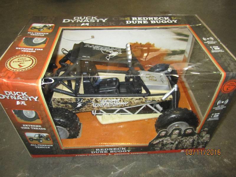 lot 145 image: Duck Dynasty RC redneck dunebuggy...