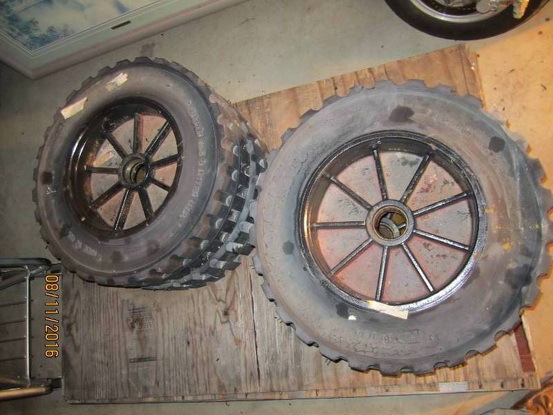 lot 37 image: 4 Like new solid rubber tires on ri...