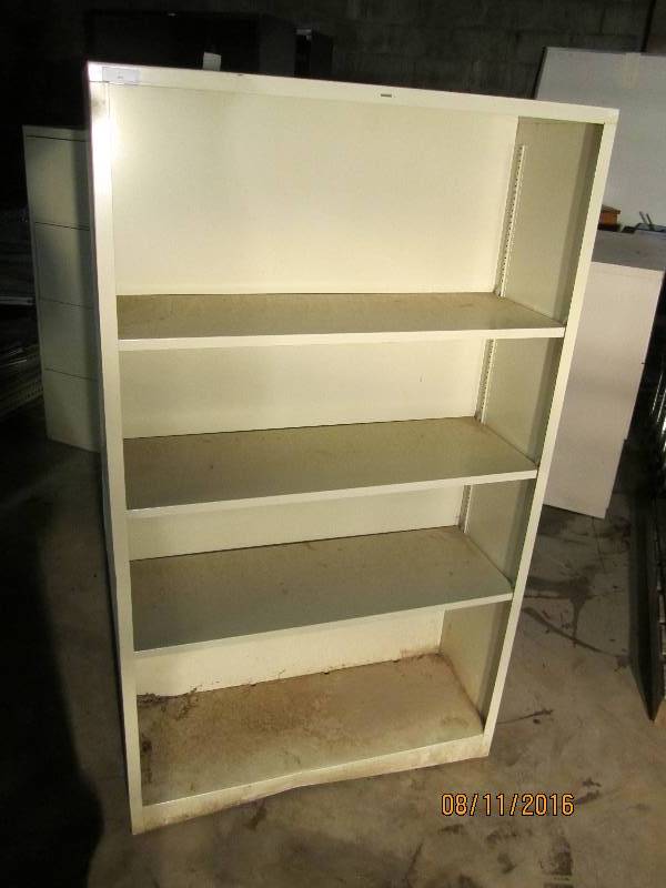 lot 244 image: Metal book shelf, 35 wide 59 tall...