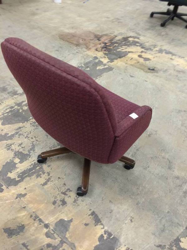 lot 99 image: Office Chair on Wheels Red