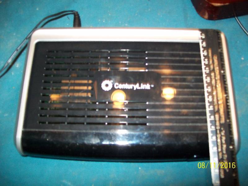 lot 21 image: CenturyLink ActionTec Model C1000A WPS 802.11 WIFI Router.