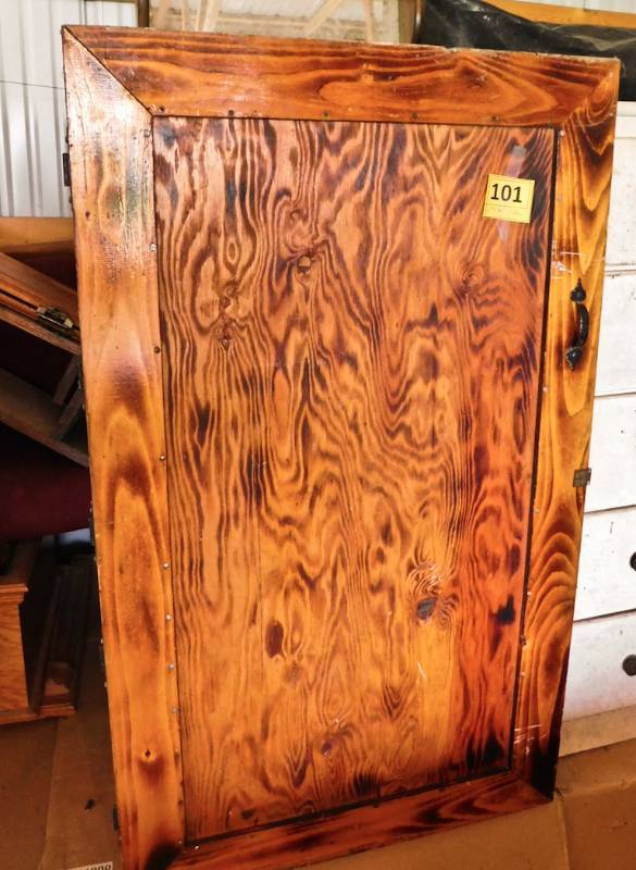 large wooden pantry like cabinet door and shelves