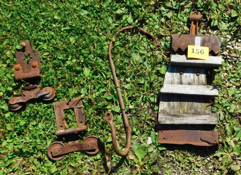 corn schucker, line rollers and rusty hook