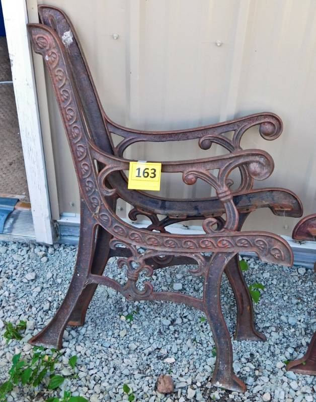 pair of cast iron bench ends