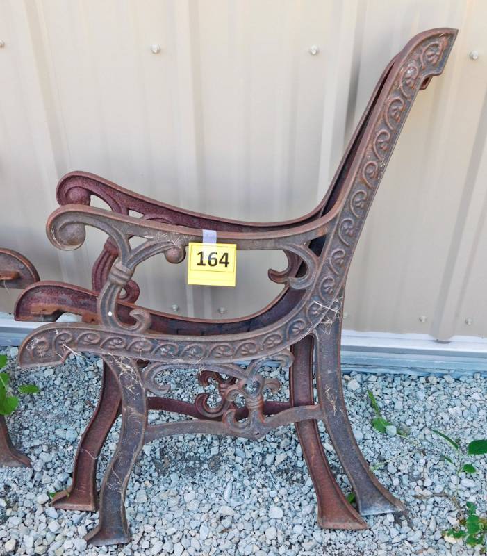 pair of cast iron bench ends