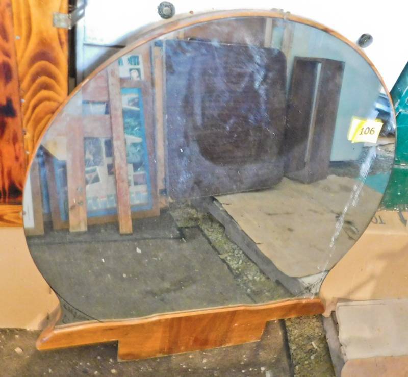 round mirror from a vintage vanity