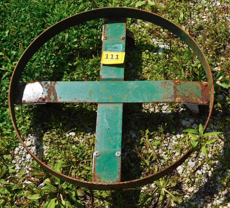 large round metal rolling stand