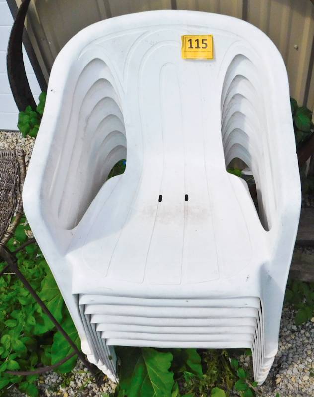 7 white plastic patio deck chairs