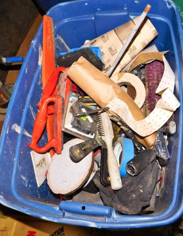large tote of sanding finishing supplies