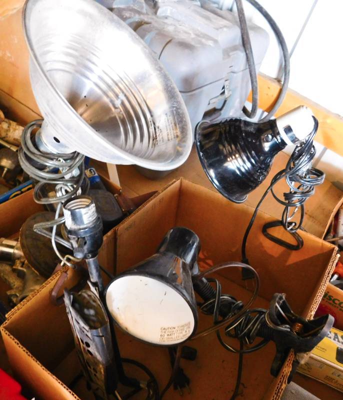 3 clip on lights and a metal cowboy boot lamp