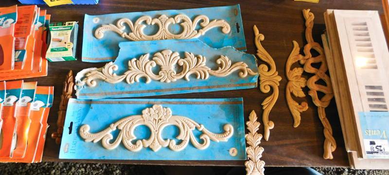 sanding supplies, wooden apliques and wooden floor vents