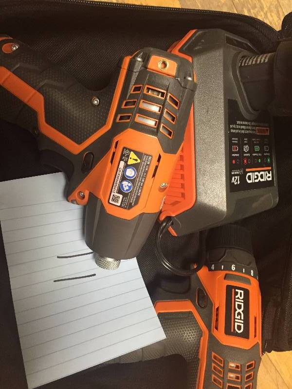 lot 11 image: Ridgid 12-Volt Hyper Lithium-Ion DrillDriver and Impact Driver Combo Kit in like new condition