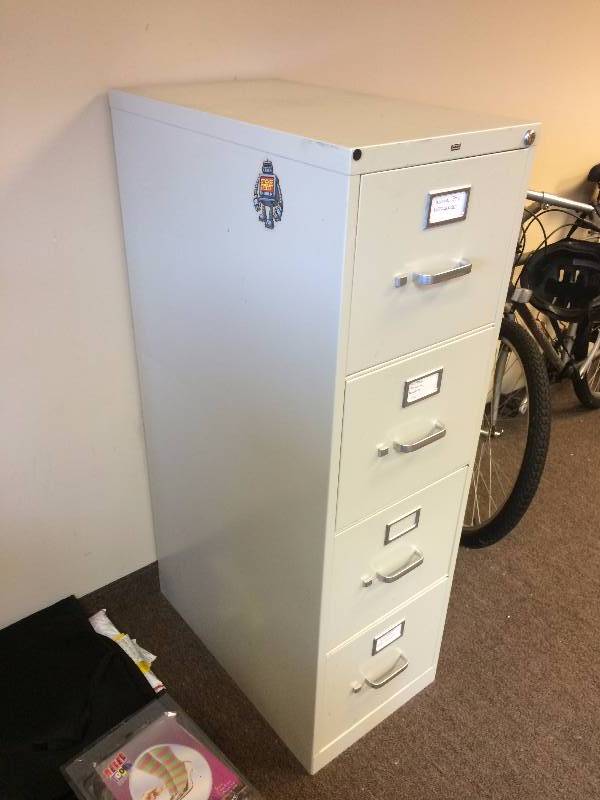 lot 13 image: Four Drawer Metal Filing Cabinet