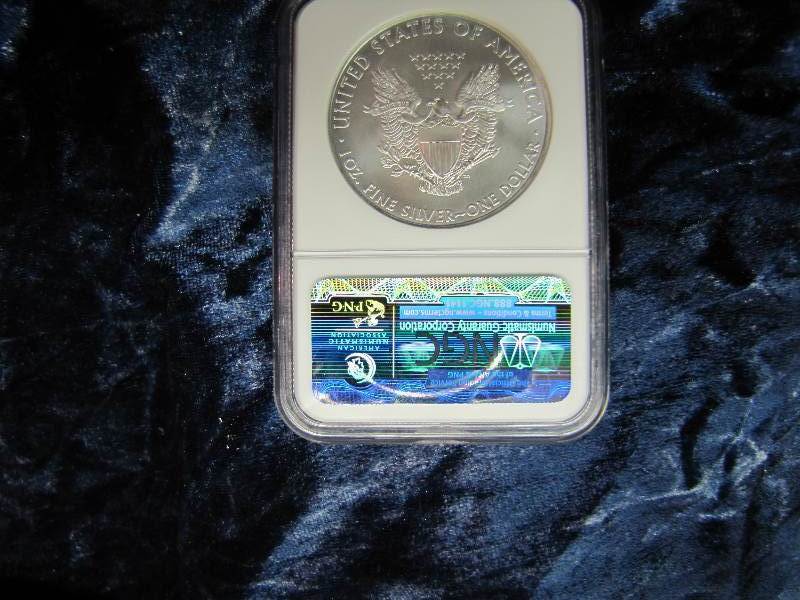 2009 S AMERICAN SILVER EAGLE 1 TROY OZ. .999 FINE SILVER IN AIR TIGHT HOLDER