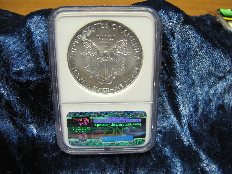 2004 S AMERICAN SILVER EAGLE 1 TROY OZ. .999 FINE SILVER IN AIR TIGHT HOLDER