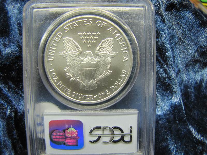 2004 S AMERICAN SILVER EAGLE 1 TROY OZ. .999 FINE SILVER IN AIR TIGHT HOLDER