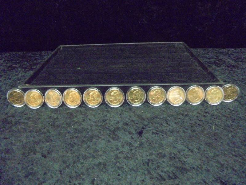 Lot - 12 Presidential Golden Dollars, BU
