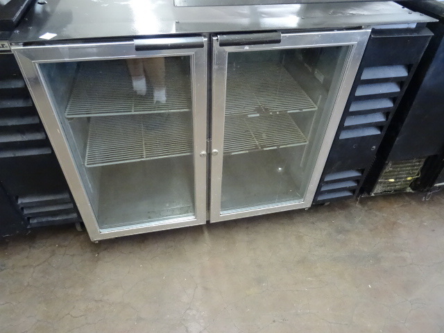 lot 74 image: Under Counter Glass Door Fridge.