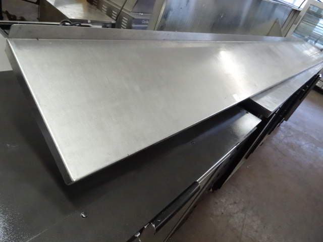 lot 75 image: Stainless Wall Shelf 124 X 12