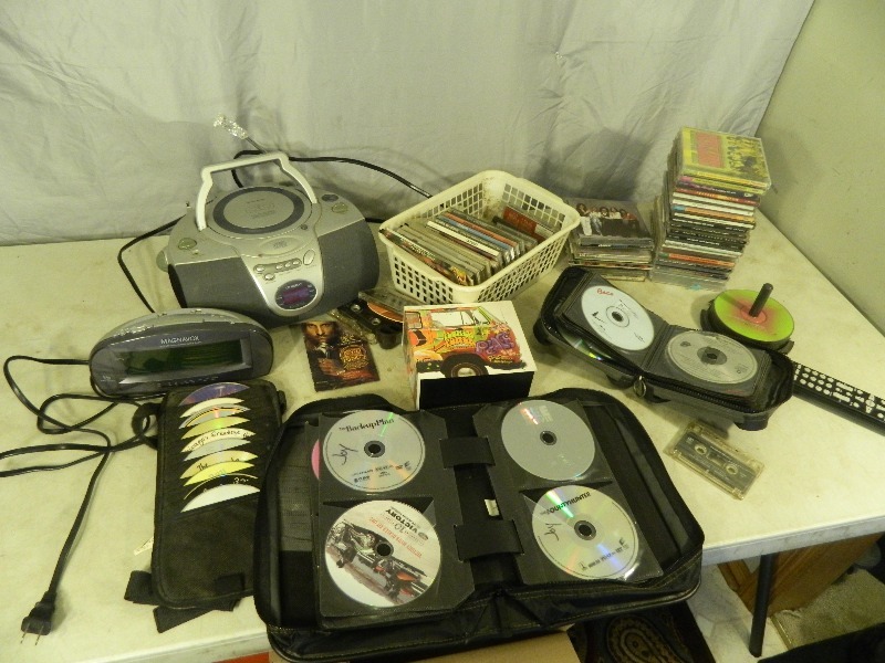 lot 107 image: Dvds, CDs, Electronics, and More