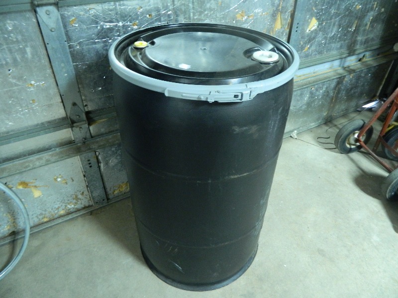 lot 34 image: Full Size Plastic Drum WIth Lid