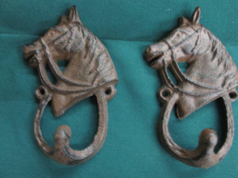 Lot of 2 Cast Iron Horse Hooks...