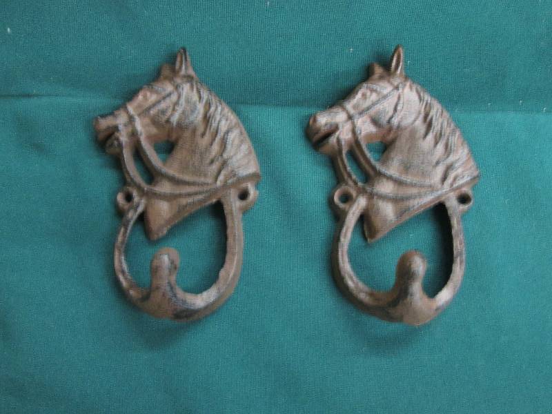 Lot of 2 Cast Iron Horse Hooks...