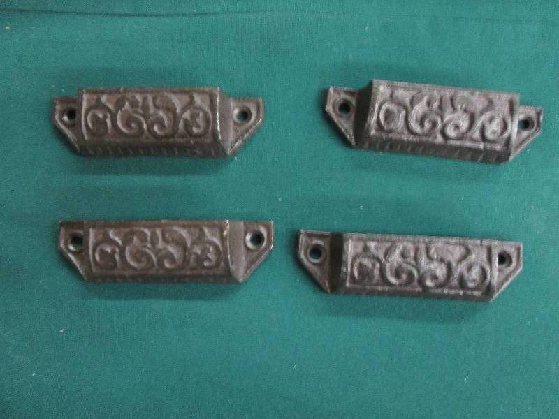 Lot of 4  3.75 inch Cast Iron Scro...