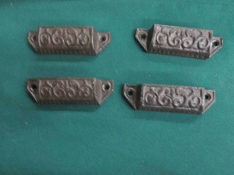 Lot of 4  3.75 inch Cast Iron Scro...