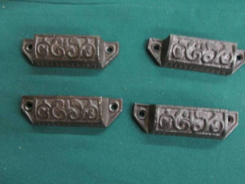 Lot of 4  3.75 inch Cast Iron Scro...
