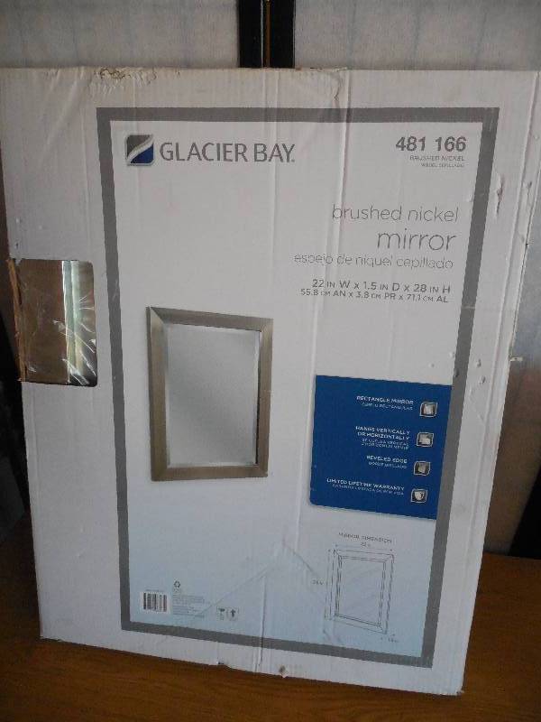 lot 79 image: 28 in. x 22 in. Framed Mirror in Brushed Nickel