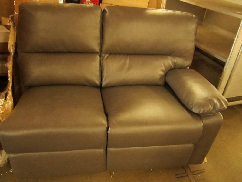 lot 34 image: 2 sections of a couch slide against...
