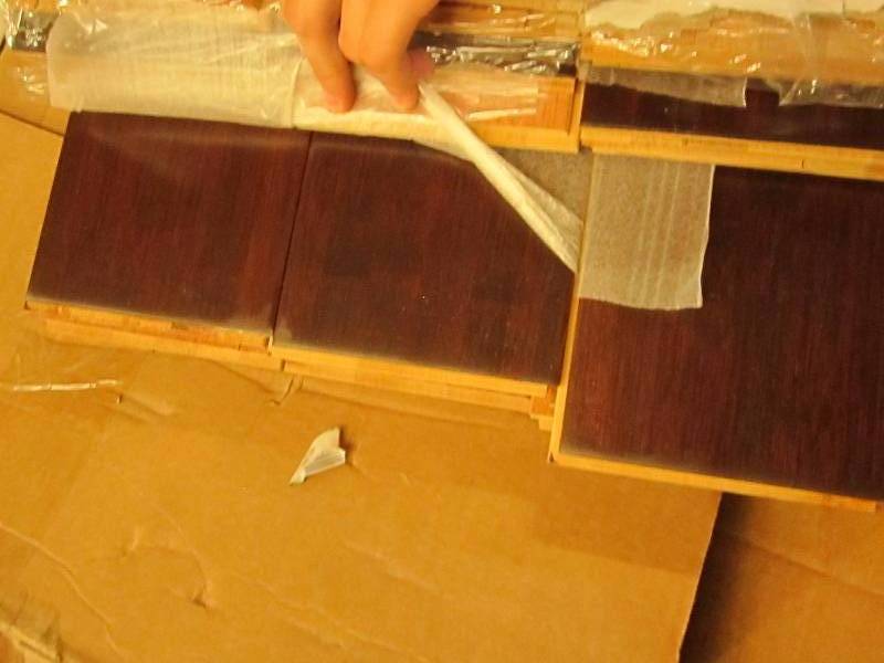 lot 63 image: One case 24.12 square feet solid ho...