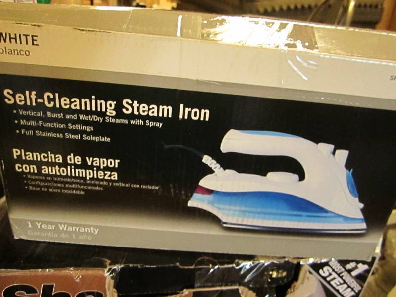 lot 96 image: Self-cleaning steam iron ...