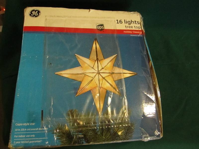 lot 127 image: 16 light capiz-style tree top star ...
