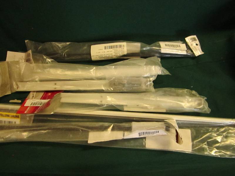lot 128 image: Mixed lot of curtain rods ...