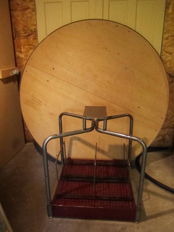 Wood table top with metal rim on me...