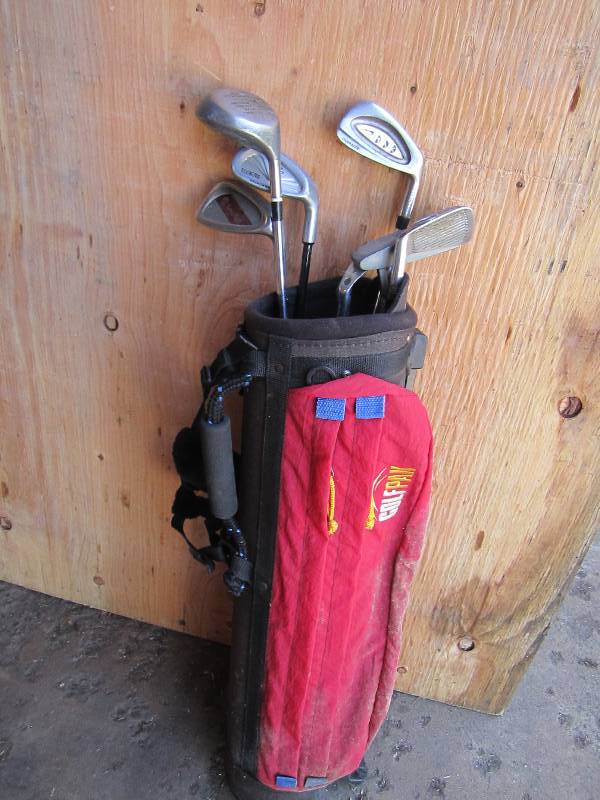 Golf bag with clubs...