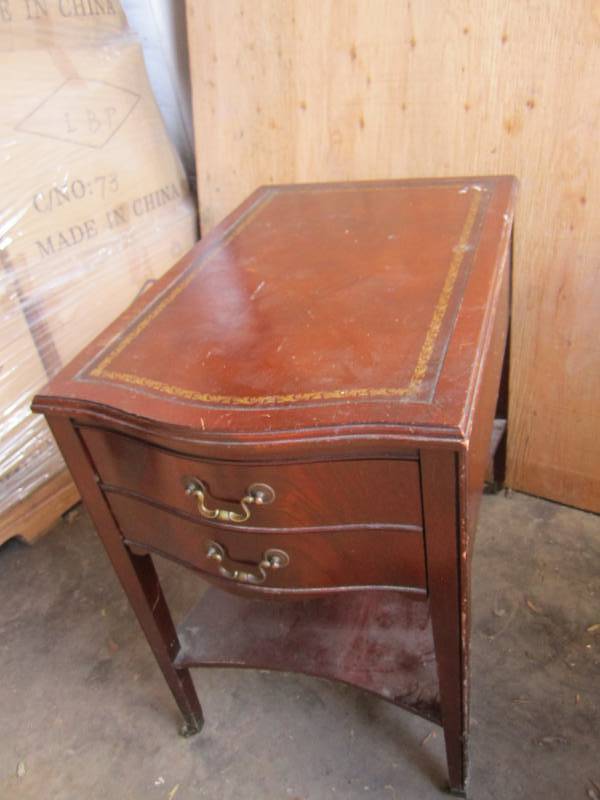 Antique table on wheels...
