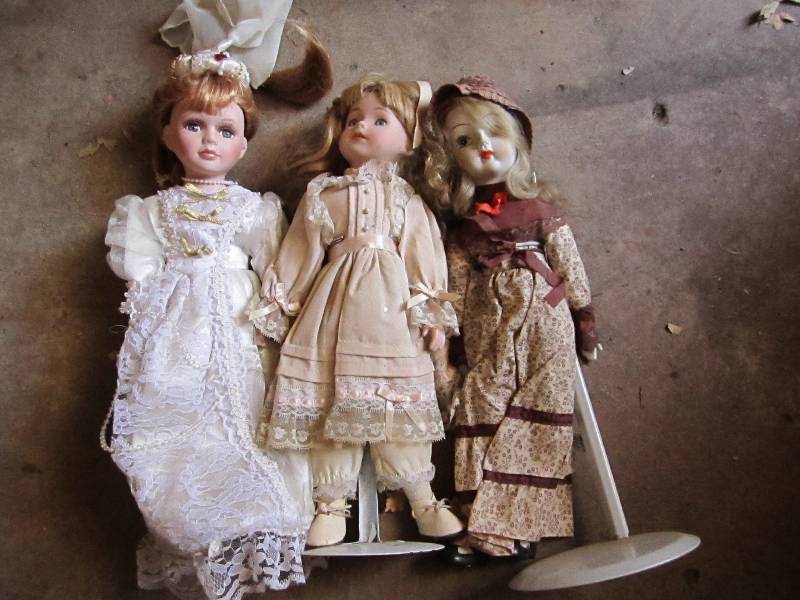 3 Porcelain dolls...