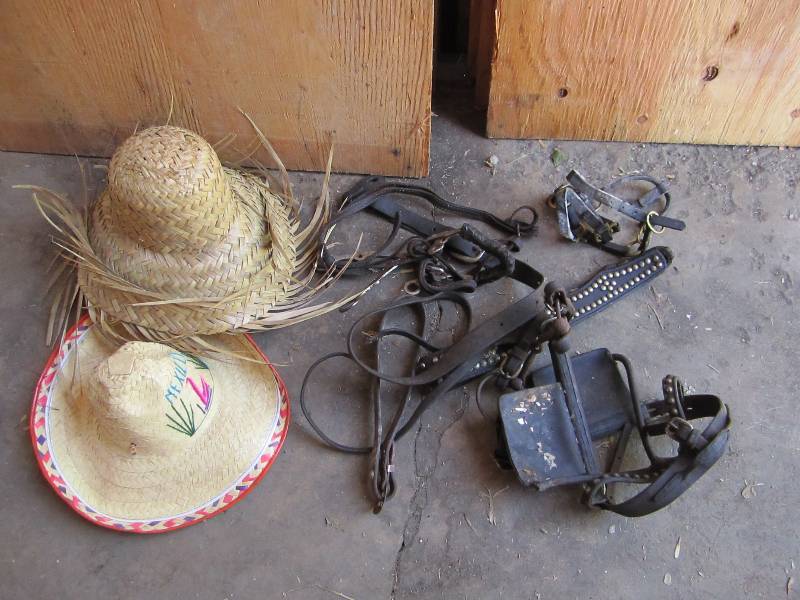 Horse tack and straw hats...