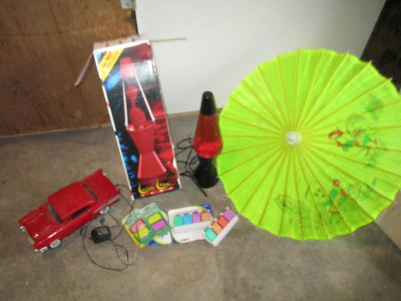Small umbrella, laval lamp, tags an...