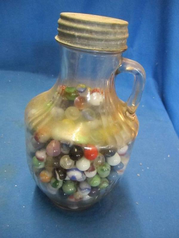Large jar of marbles ...