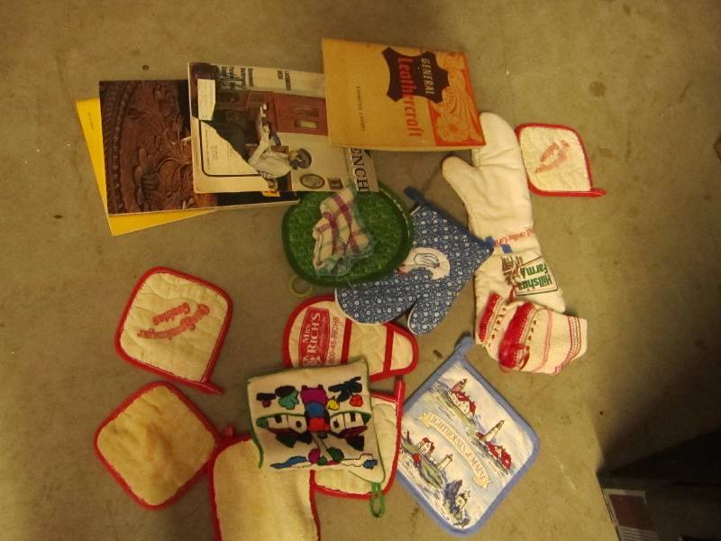 Lot of kichen hot pads and books ...