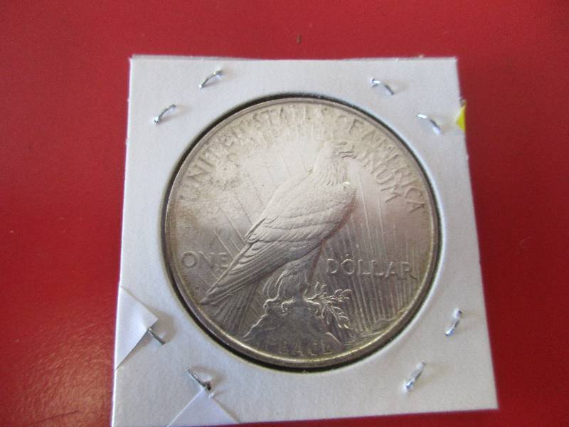 1922-D Silver Peace Dollar in BU condition with original mint luster