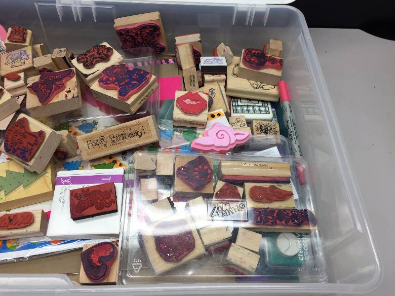 lot 58 image: TUB FULL OF ASSORTED RUBBER STAMPS