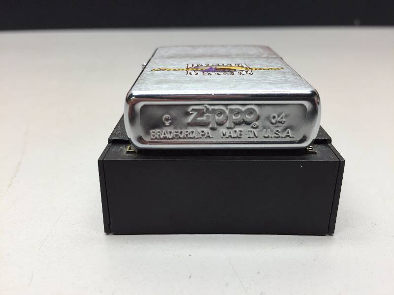 lot 73 image: LEATHER WRAPPED METAL ASHTRAY AND LIGHTER CASE (MARLBORO)
