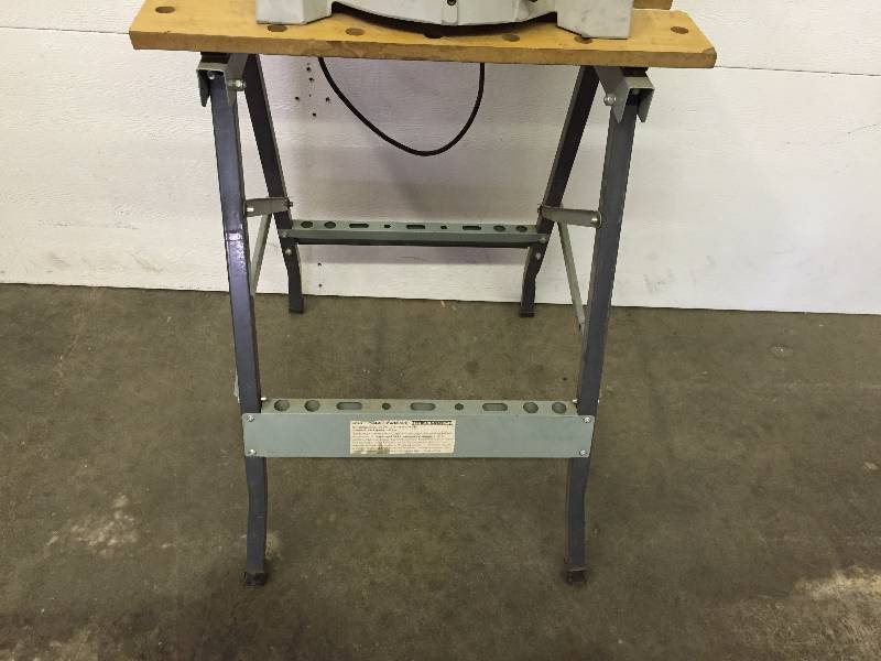lot 75 image: DELTA 8 14 COMPOUND MITER SAW (MODEL 36-040) ON WORK BENCH