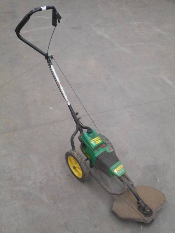 lot 15 image: Weed Eater WT1300 Gas-Powered Line ...