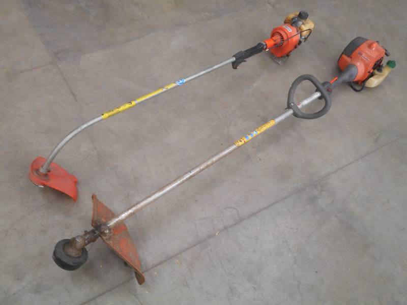 lot 35 image: (1) Husqvarna & (1) Stihl Gas Grass...